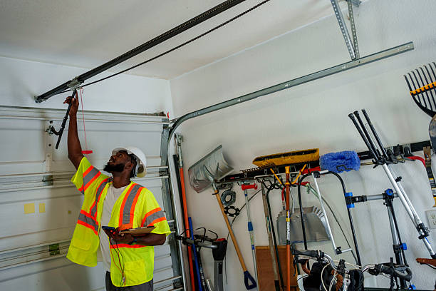 Professional Garage Door Panel Replacement technician working in Osceola, IN